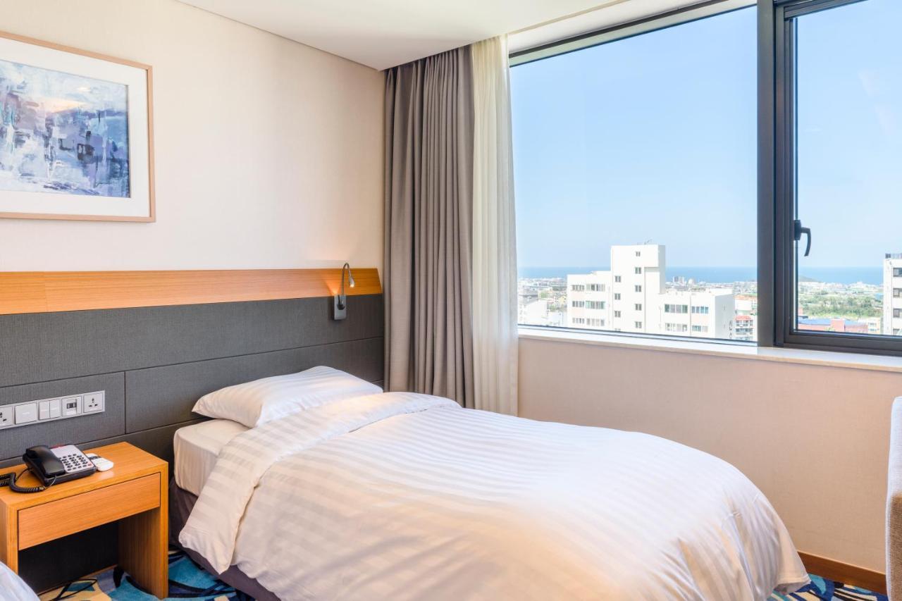 Shin Shin Hotel Jeju Airport Экстерьер фото